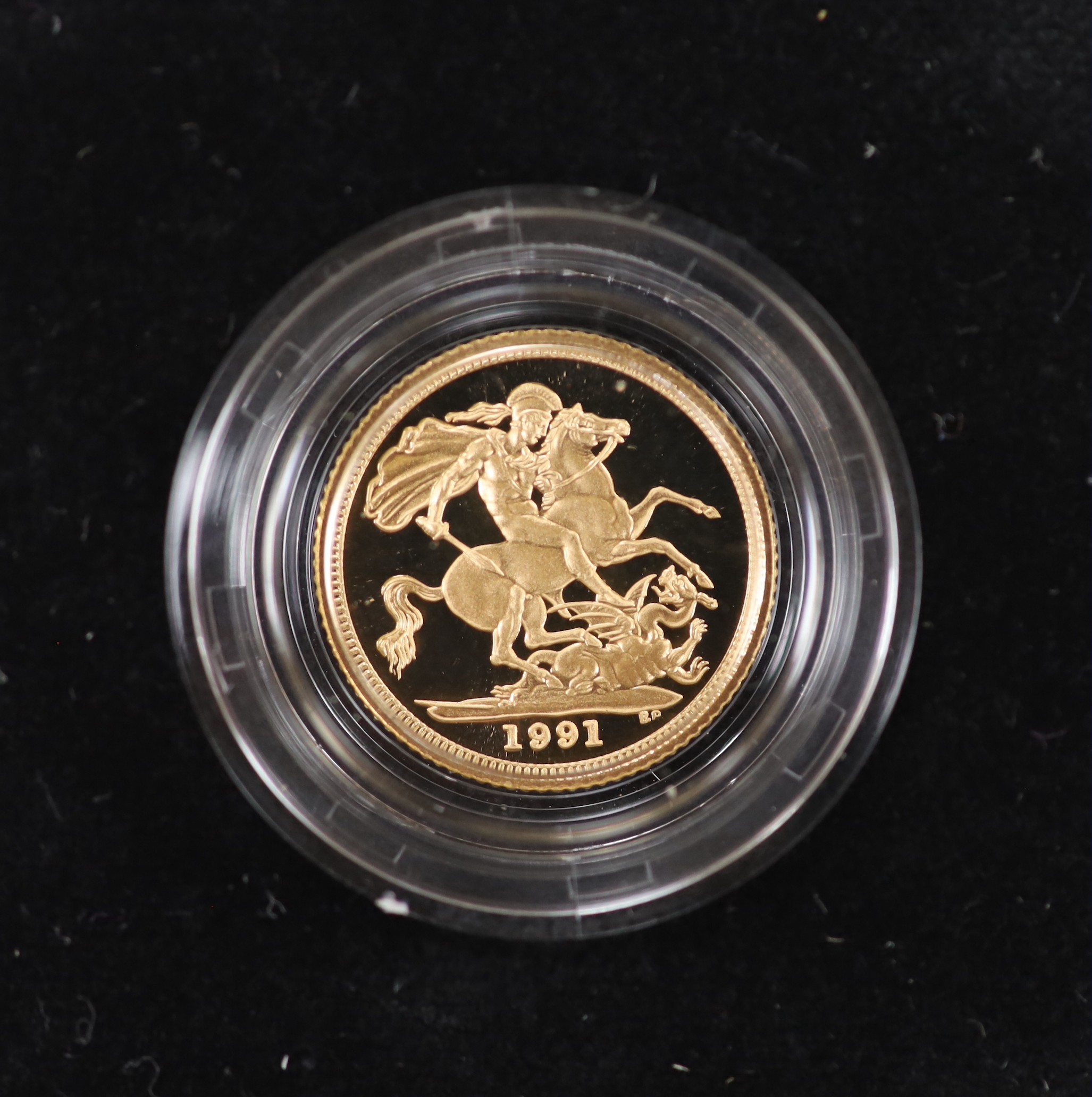 An Elizabeth II 1991 gold proof half sovereign, with box and certificate.